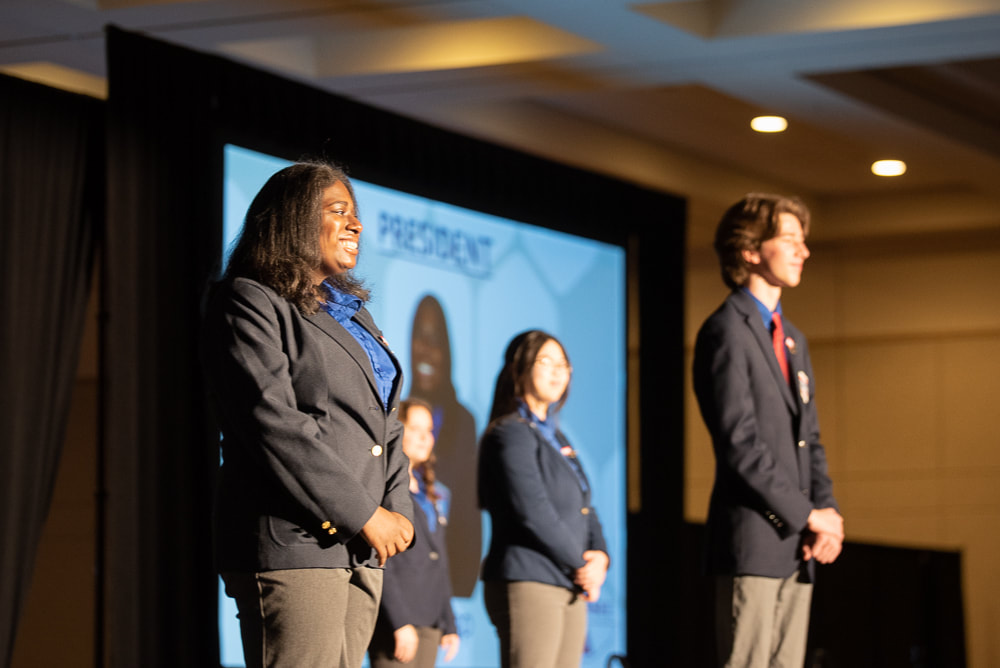 2021-2022 State Officers Onstage at the 2022 State Leadership Conference.
